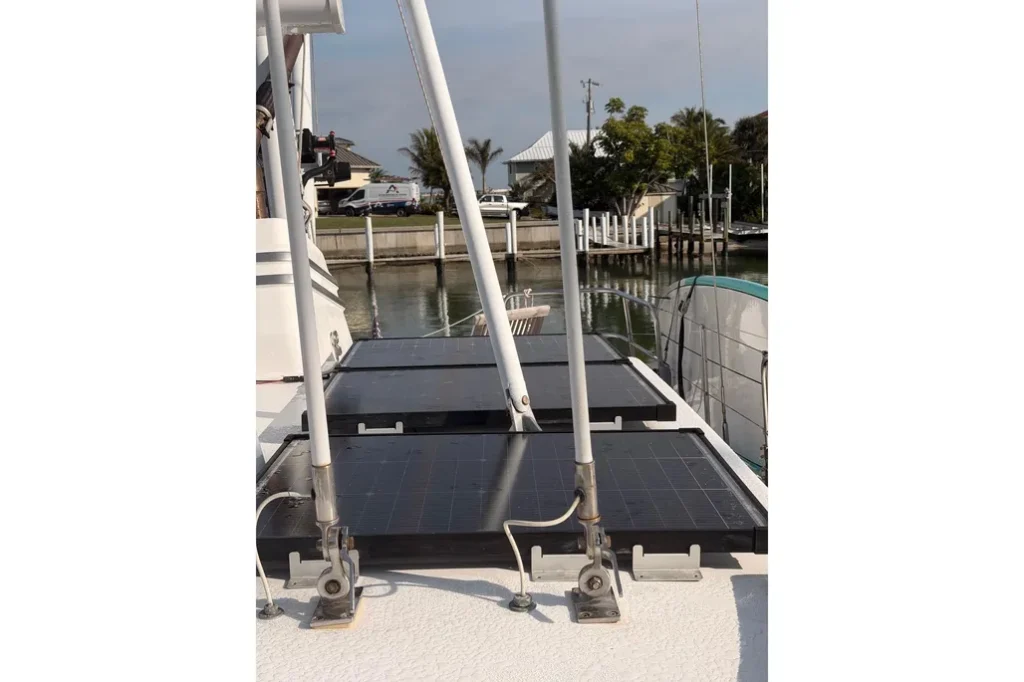 2001 Nordhavn 40 - Wayward Snug - Solar panels mounted on boat deck with mast and stays