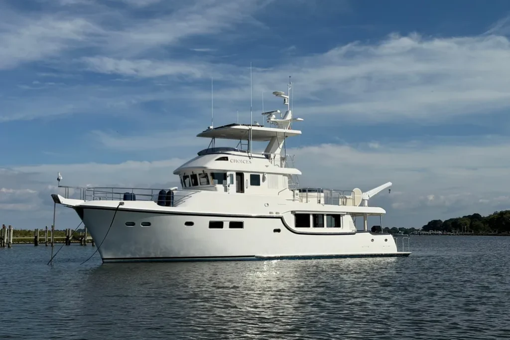 2016 Nordhavn 60 - CHOICES - Port side profile dockside with flybridge and radar mast
