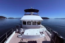 2016 Nordhavn 52 - Aleoli - Aft cockpit with teak deck looking forward to pilothouse underway