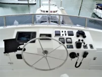 2011 Nordhavn 60 Trawler ONYXIA helm with navigation equipment and steering wheel