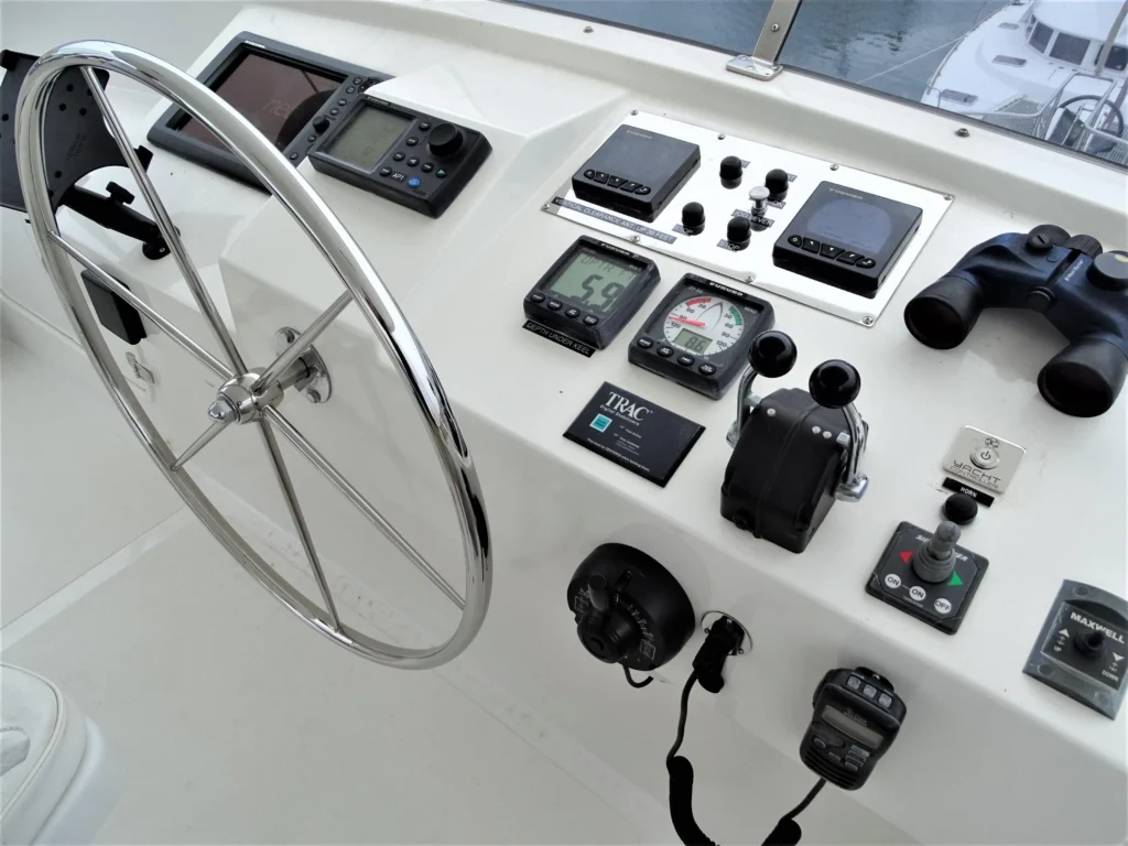 2011 Nordhavn 60 Trawler ONYXIA helm with navigation instruments and steering wheel