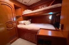 2006 Nordhavn 64 - KARIWA 17 - Luxurious wooden cabin interior with bunk beds on a 2006 Nordhavn 64 yacht.