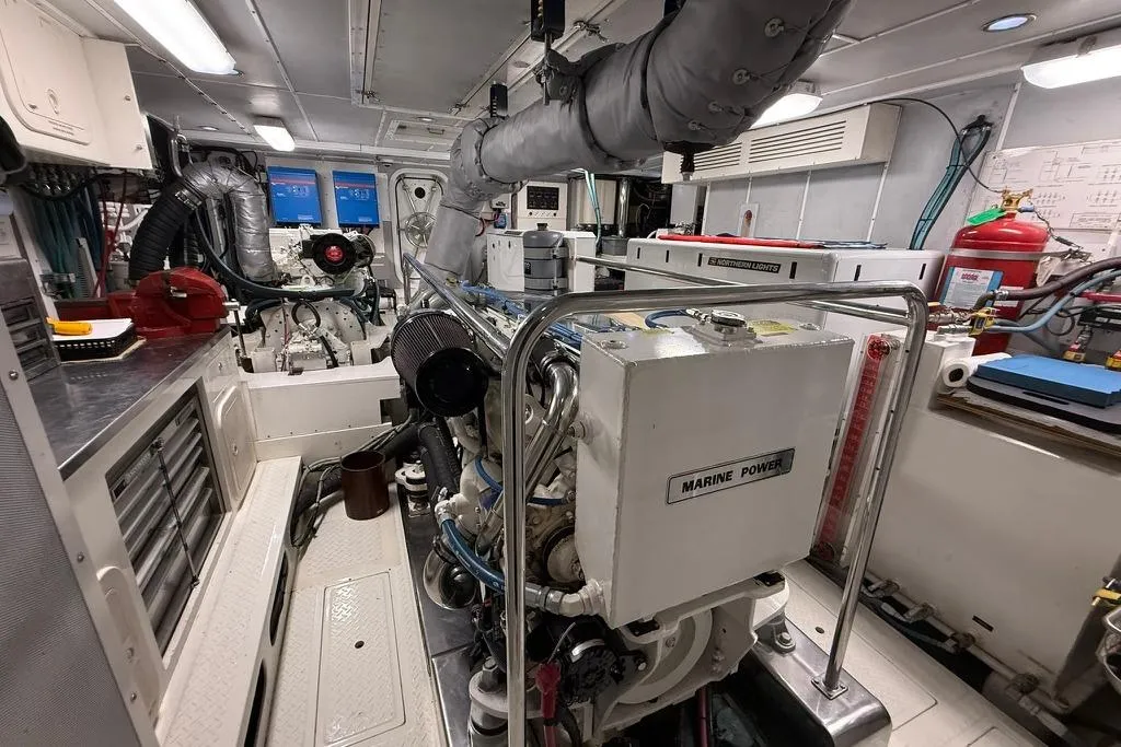 2006 Nordhavn 64 - KARIWA 28 - Engine room of a 2006 Nordhavn 64 yacht, featuring marine power systems and equipment.