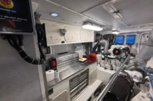 2006 Nordhavn 64 - KARIWA 29 - Engine room of a 2006 Nordhavn 64 yacht, featuring machinery and control panels.