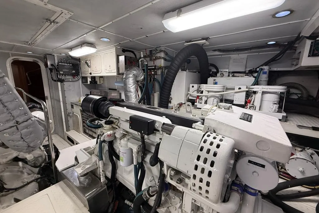 2006 Nordhavn 64 - KARIWA 30 - Engine room of a 2006 Nordhavn 64 yacht, showcasing machinery and equipment.