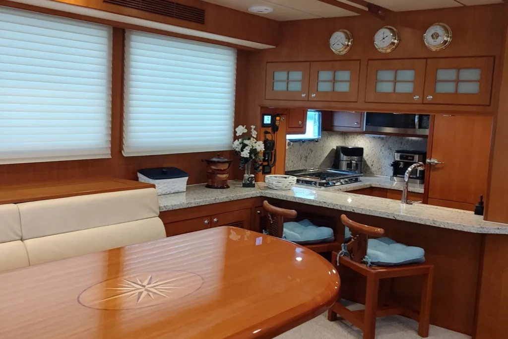2017 Nordhavn 60 - REDEEMED 6 - Luxurious 2017 Nordhavn 60 yacht interior with elegant kitchen and dining area.