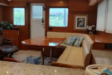 2017 Nordhavn 60 - REDEEMED 8 - Luxurious interior of a 2017 Nordhavn 60 yacht with elegant seating and decor.