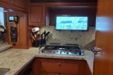 2017 Nordhavn 60 - REDEEMED 11 - Luxurious 2017 Nordhavn 60 yacht kitchen with granite countertops and modern appliances.