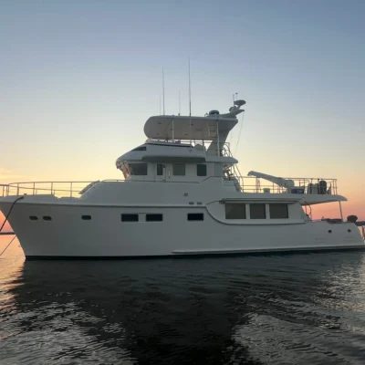2017 Nordhavn 60 - REDEEMED 1 - 2017 Nordhavn 60 yacht at sunset on calm waters.