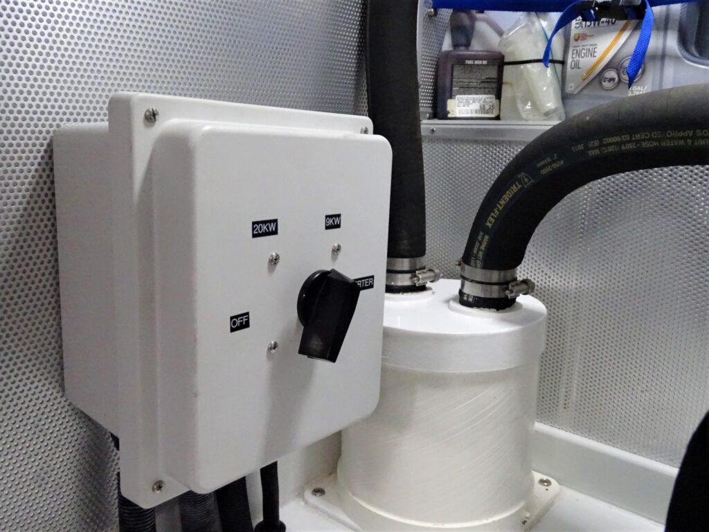 2017 Nordhavn 60 - REDEEMED 38 - Close-up of a switch and hoses in an engine room.