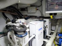 2017 Nordhavn 60 - REDEEMED 46 - The engine room of a 2017 Nordhavn 60 features complex piping and technical equipment.
