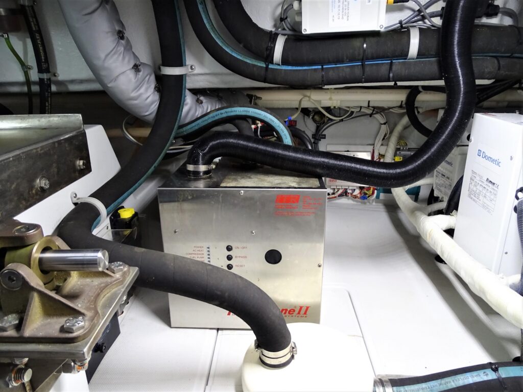 2017 Nordhavn 60 - REDEEMED 47 - The engine room of a 2017 Nordhavn 60 shows technical equipment and piping.