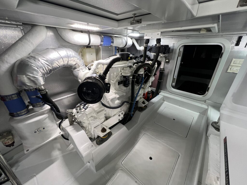 2017 Nordhavn 60 - REDEEMED 36 - The engine room of a 2017 Nordhavn 60 shows a clean, well-organized engine area.